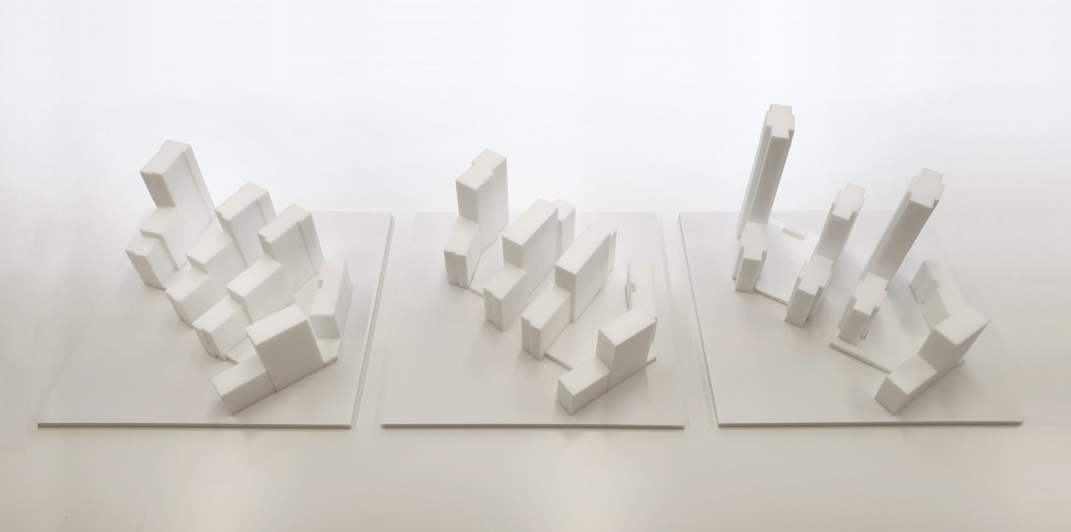 The image shows 3 architectural foam models with different massing options for Wembley Park Towers project.